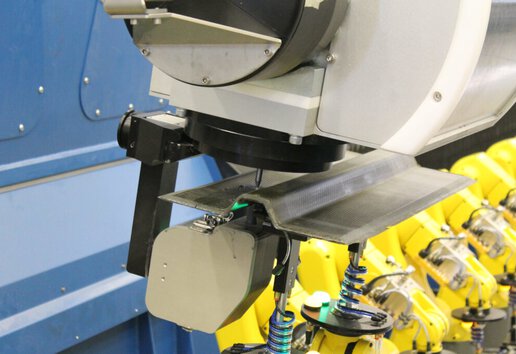 Adaptive water jet cutting of an aerospace component.