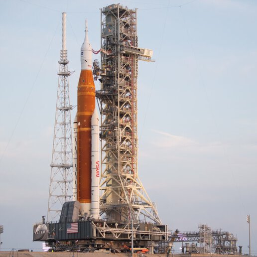 Space launch vehicle on launch pad.