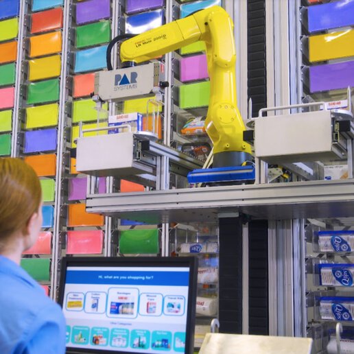 PAR Systems fulfillment system being directed by warehouse employee.