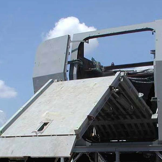 Sideport shell door being opened on a ship.