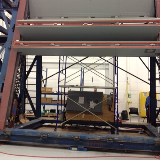 Helo hangar door in manufacturing warehouse.