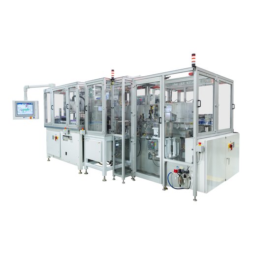Automated manufacturing machine for disposable medical devices