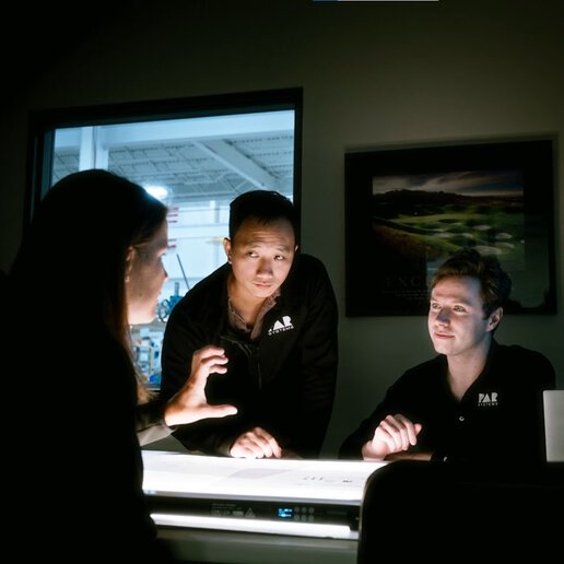 PAR Systems engineers and teammates discussing system integration