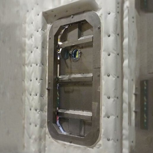 Marine door updated with COMFIRE N30 Retrofit Kit for additional fire protection.
